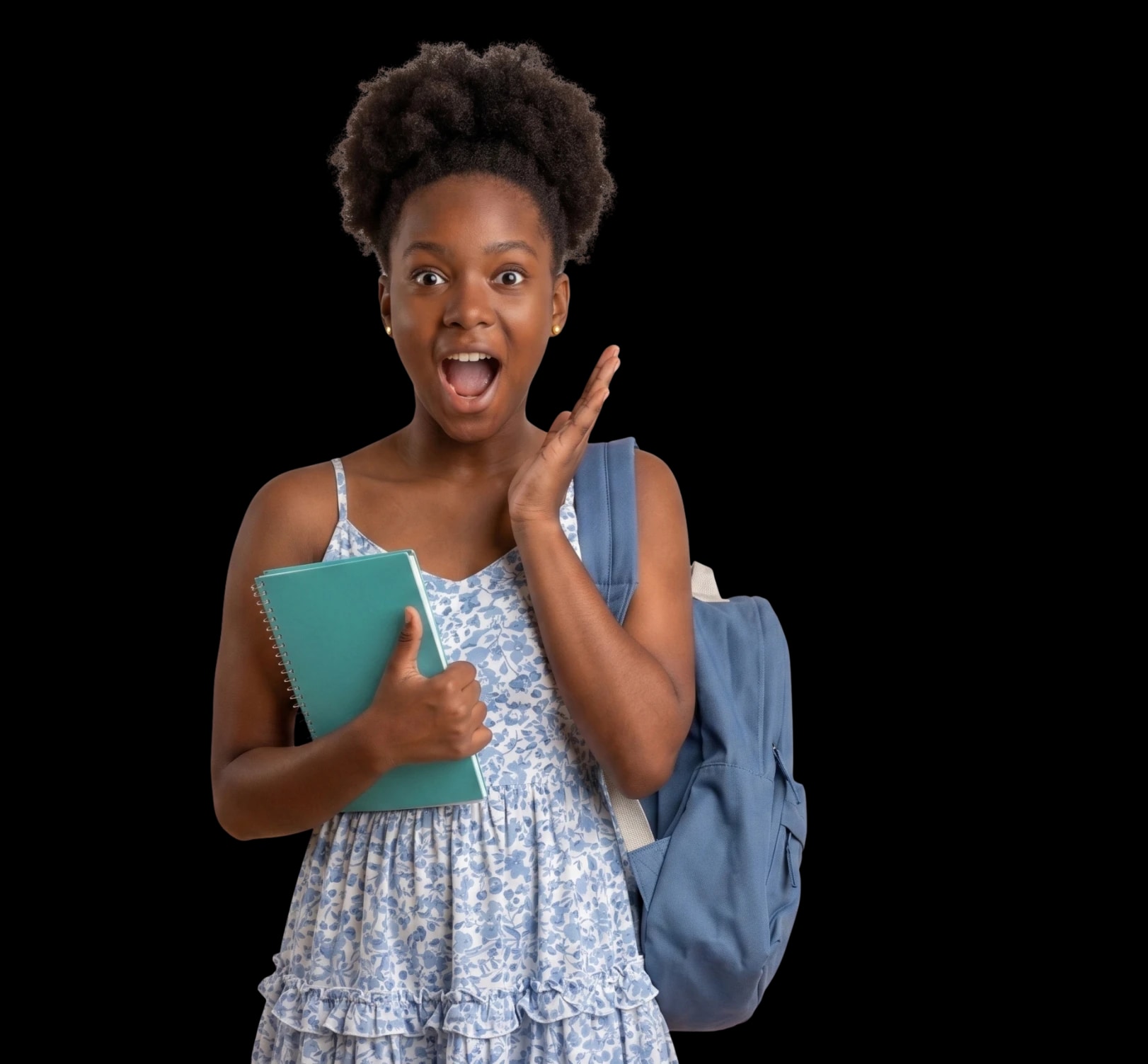 Excited student holding a notebook and wearing a backpack
